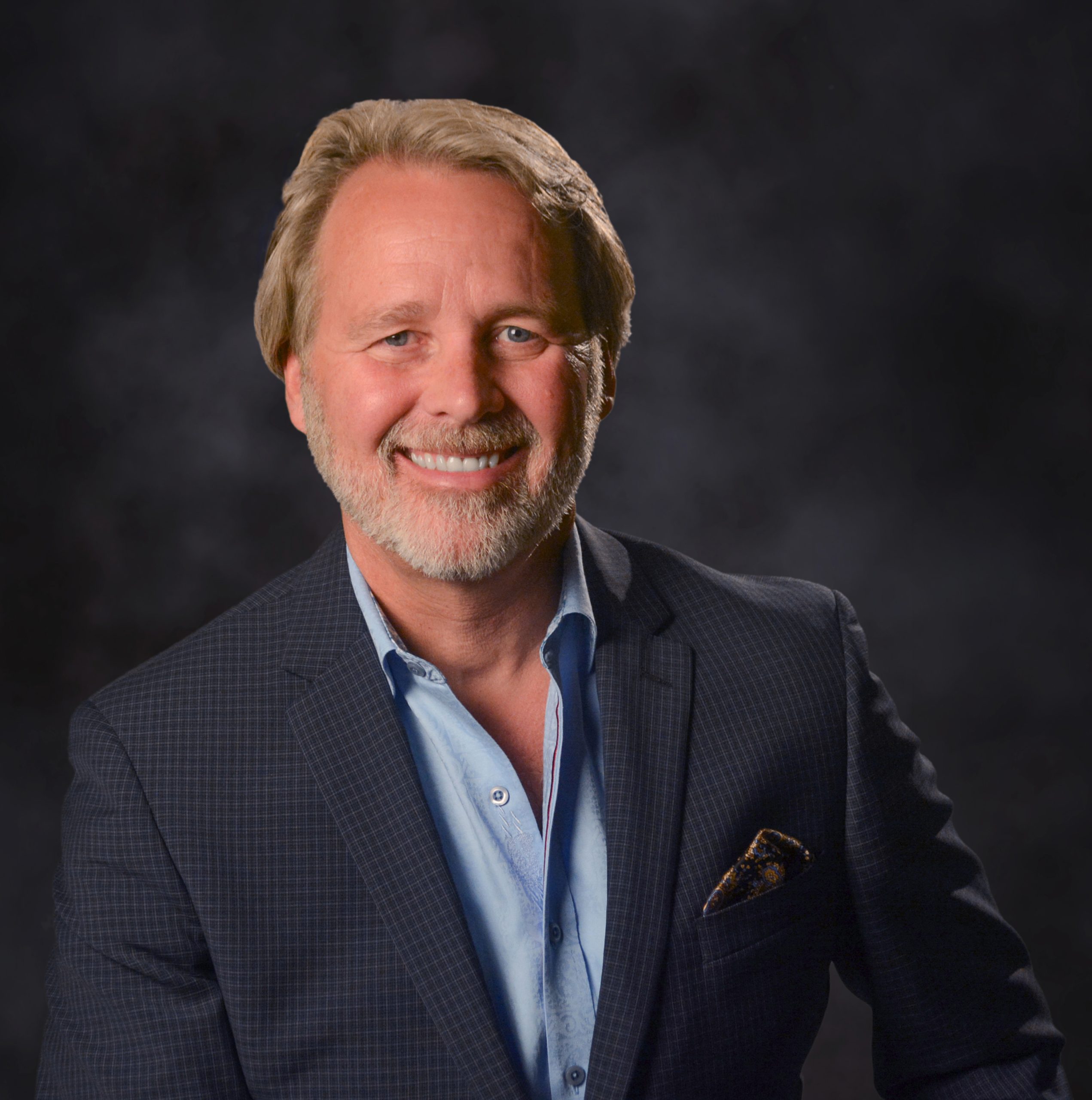 Bill strang a smiling man with blond hair and a beard is wearing a dark patterned suit jacket a light blue shirt and a pocket square posing in front of a dark blurred background A smiling man with blond hair and a beard is wearing a dark patterned suit jacket a light blue shirt and a pocket square posing in front of a dark blurred background Reimagining the modern bathroom space