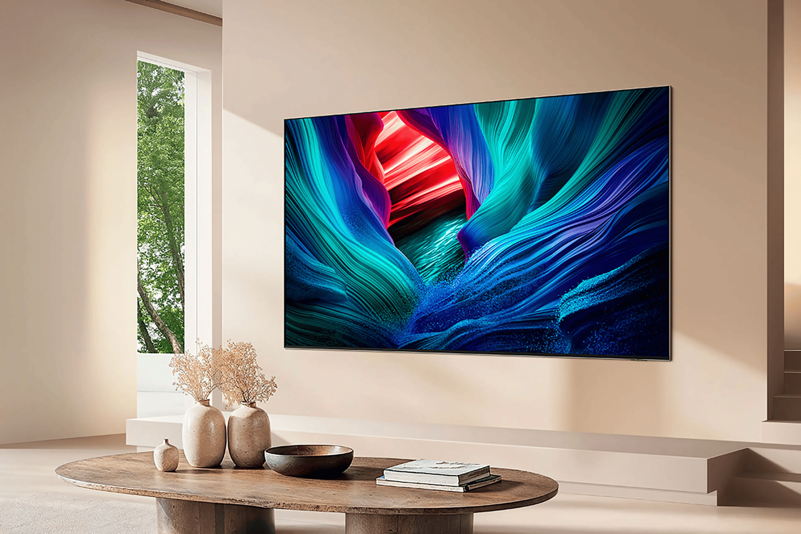 Large flat screen tv displaying vibrant abstract imagery mounted on a beige wall in a modern living room Samsung micro rgb time best inventions 2025 2026 technology designer magazine performance home award winners